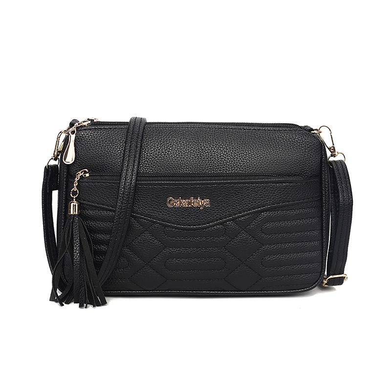 Retro commuter fringed bag autumn and winter new large-capacity fashion shoulder underarm bag high-end versatile diagonal span bag women