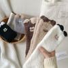 Autumn and winter new cartoon little monster embroidery three-dimensional small ears coral fleece sleeping socks thermal floor socks medium tube socks