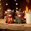 Cute Cattle Desk Ornaments Christmas Highland Cow Figurine, Resin Holiday Statue with Santa Hat & Holly Theme Decor Gift Box, Sitting Calf Desktop