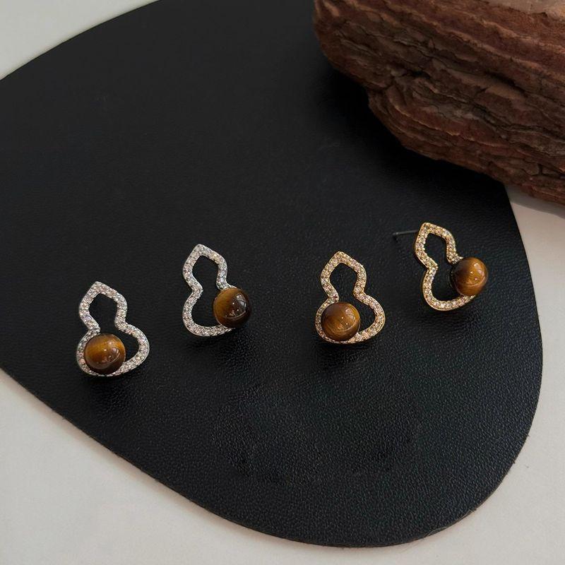 K real gold electroplated silver needle tiger's eye stone gourd stud earrings new Chinese temperament earrings niche design earrings women