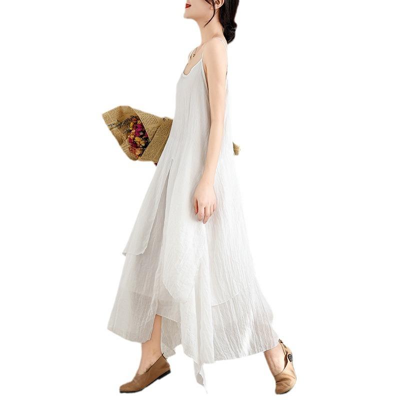 Cotton and linen suspender dress women's 2025 summer new fan solid color irregular skirt big pendulum temperament long skirt