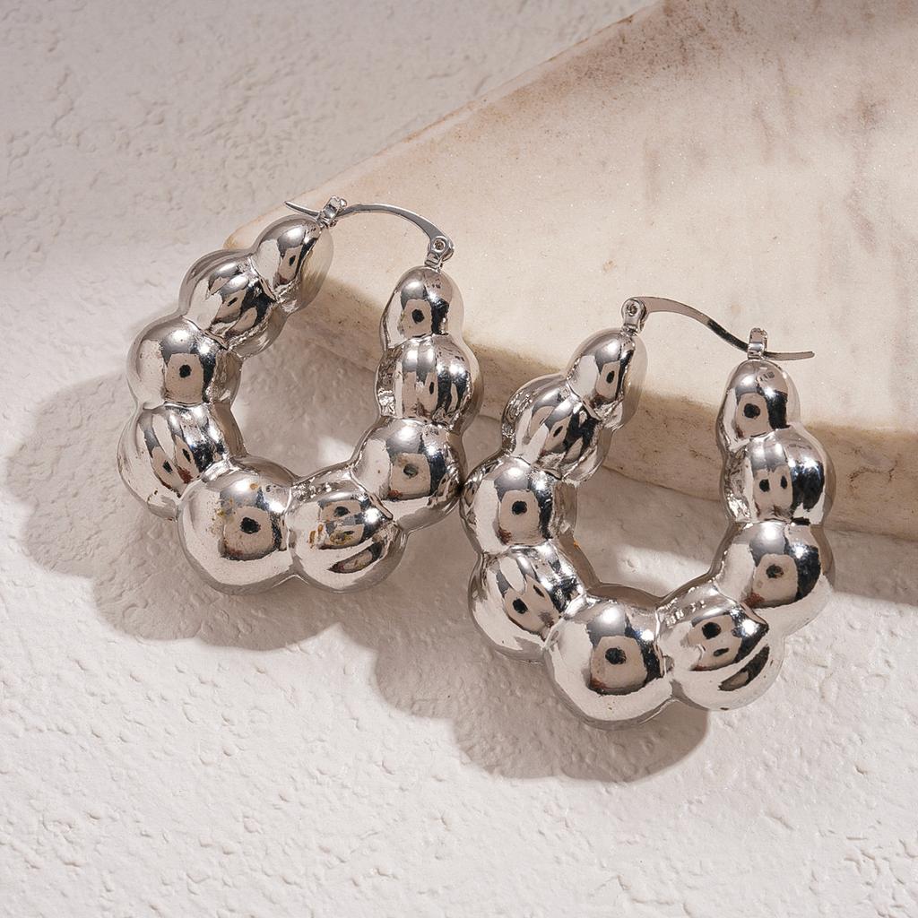 Metal light-sensitive surface geometric round U-shaped ear buckle niche environmentally friendly fashion earrings