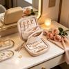 Travel Jewelry Storage Case with Dedicated Compartments, Ring Roll, Earring Holders, Pouches, and Zip-Around Closure
