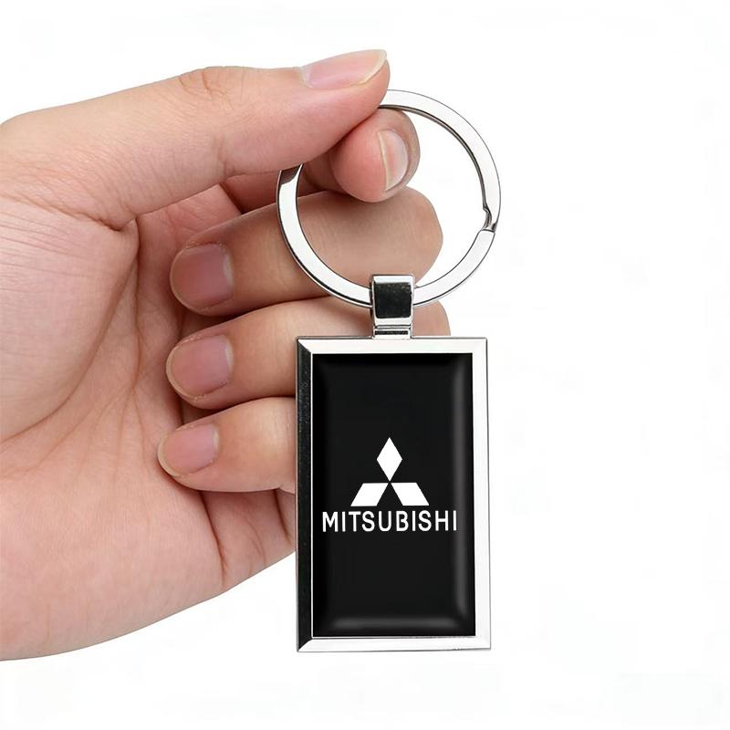 

Car Badge Keychain Rubber Metal Keyring Ornaments For Mitsubishi Pajero Colt Space Delica Triton Ralliart Galant Attrage Montero