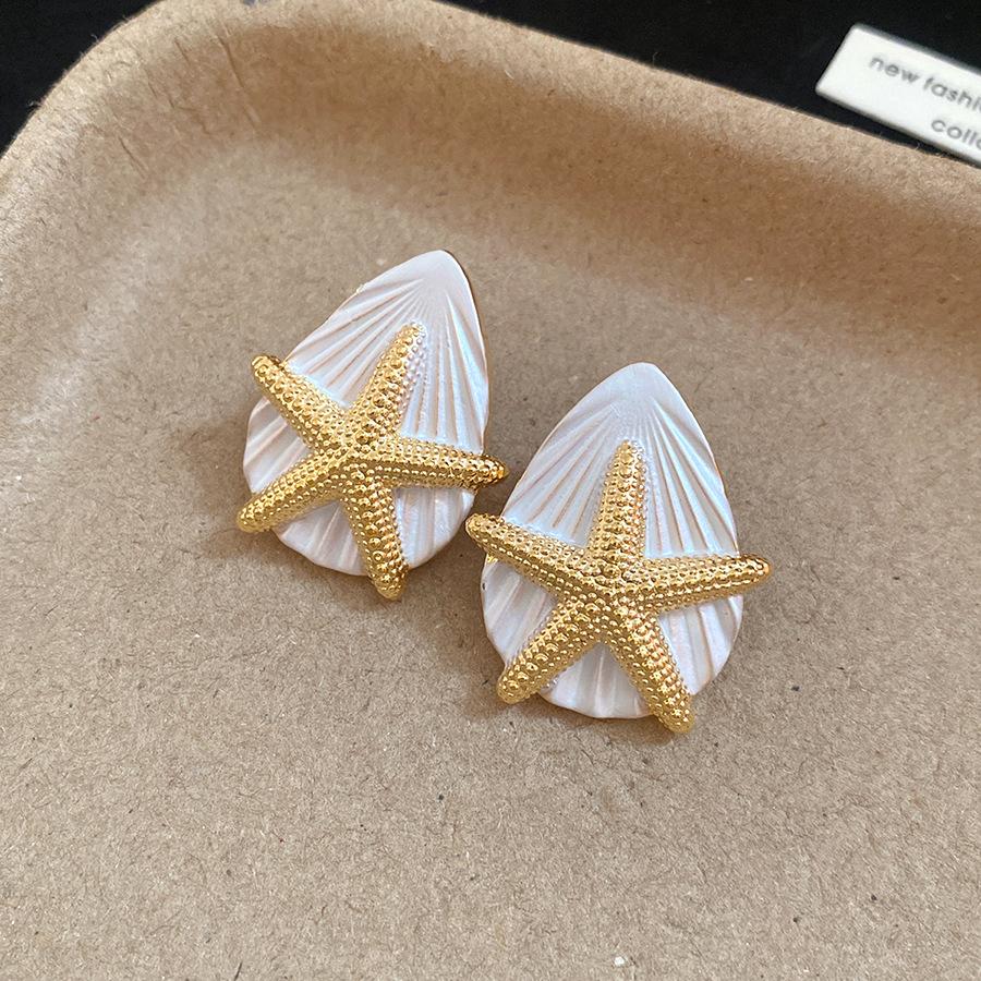European and American silver needles dripping oil starfish water drop earrings vacation style temperament earrings light luxury high-end earrings