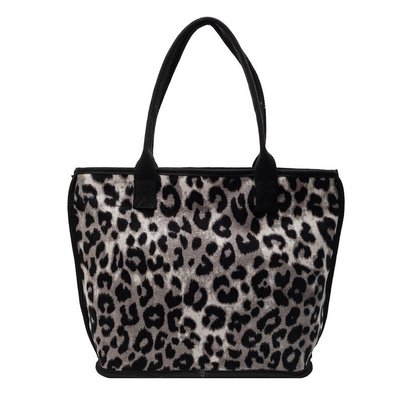 

Оптовая модная сумка через плечо женская 2025 новая трендовая текстура универсальная большая вместимость на выход леопардовый принт сумка-тоут чёрный