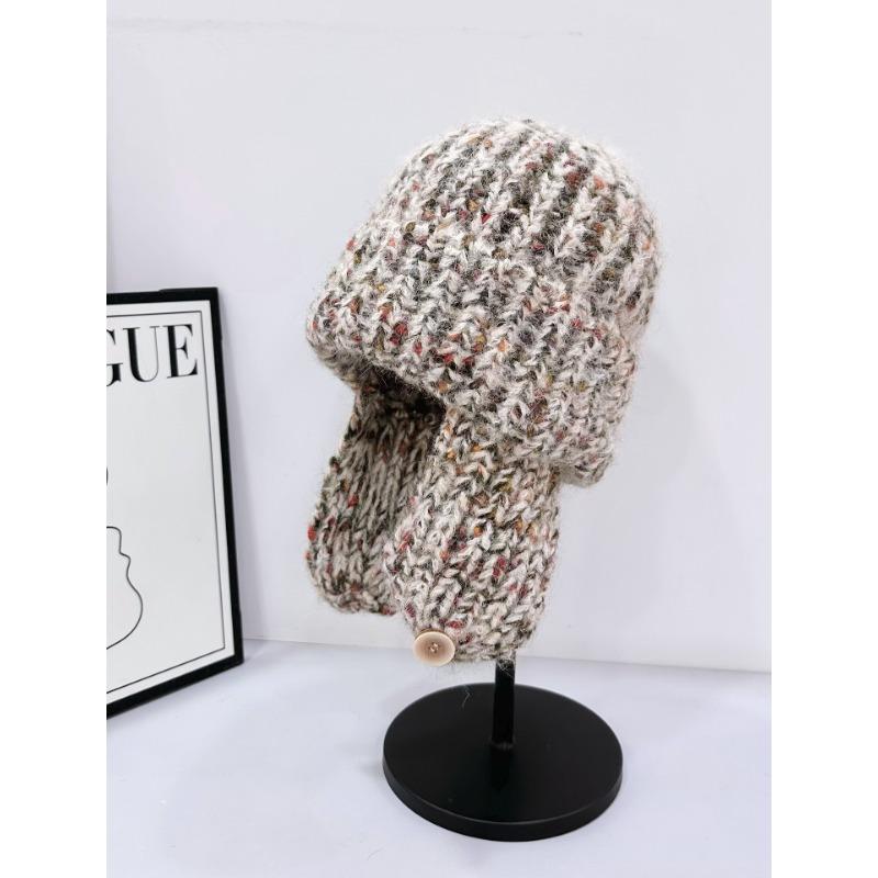 New snowflake point flanged wool hat women's autumn and winter warm knitted hat vertical strip bag head cold hat tide