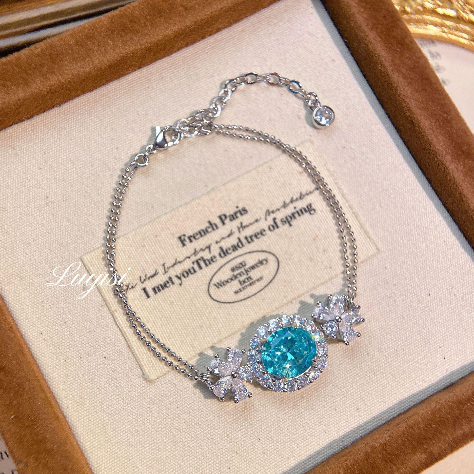 

2026 Romantic Mint Paraiba Pendant Necklace Full Diamond Cross Flower Set Oval Zircon Bracelet