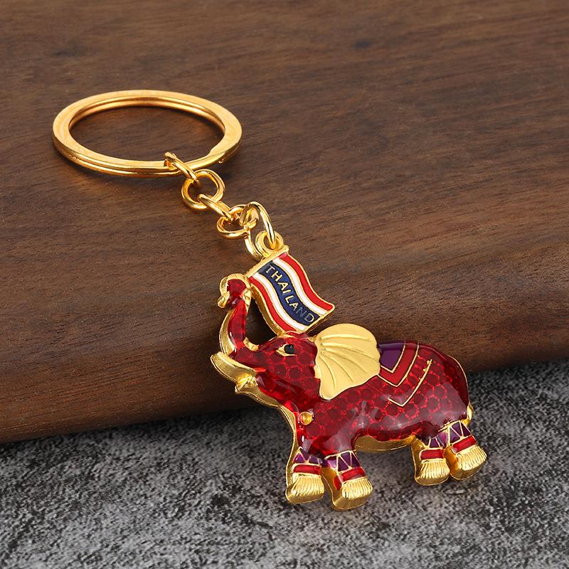 Elefante de Guerra Esmaltado Tailandia Venta Caliente Elefante con Goteo de Aceite Colgante de Llavero para Coche Pequeño Regalo