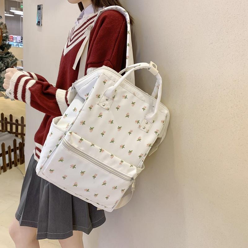 School bag female ins style Korean girl junior high school student middle school student literary small fresh floral backpack clip backpack