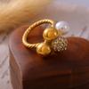 European & American Multi-Sphere Diamond-Set Pearl Twist Ring, Elegant Light Luxury, 18k Gold-Plated Titanium Steel