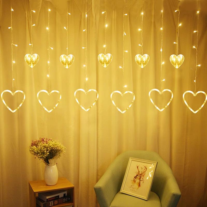 Twinkling LED Curtain Lights with Wishing Ball, Star, and Bell Accents for Christmas and Birthday Decor