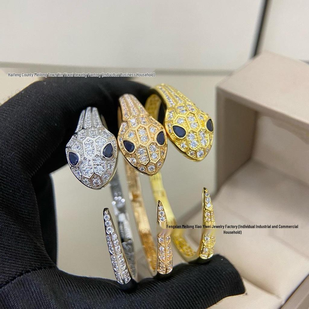 Elegant Serpent Bangle: Gold Open Bracelet with Blue-eyed Snake Design – Perfect Gift for Trendy Women