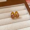 Silver Needle Leopard Print Diamond Tassel Earrings with Retro Ethnic Style and Unique Design.