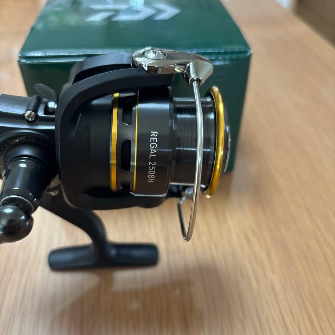 Used Daiwa REGAL 2508H spinning reel in good condition
