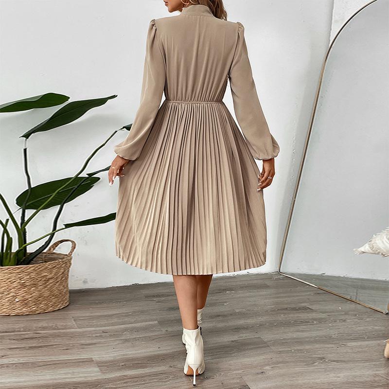 Elegant Pleated Skirt Dress with Bow Tie Collar and Puff Sleeves