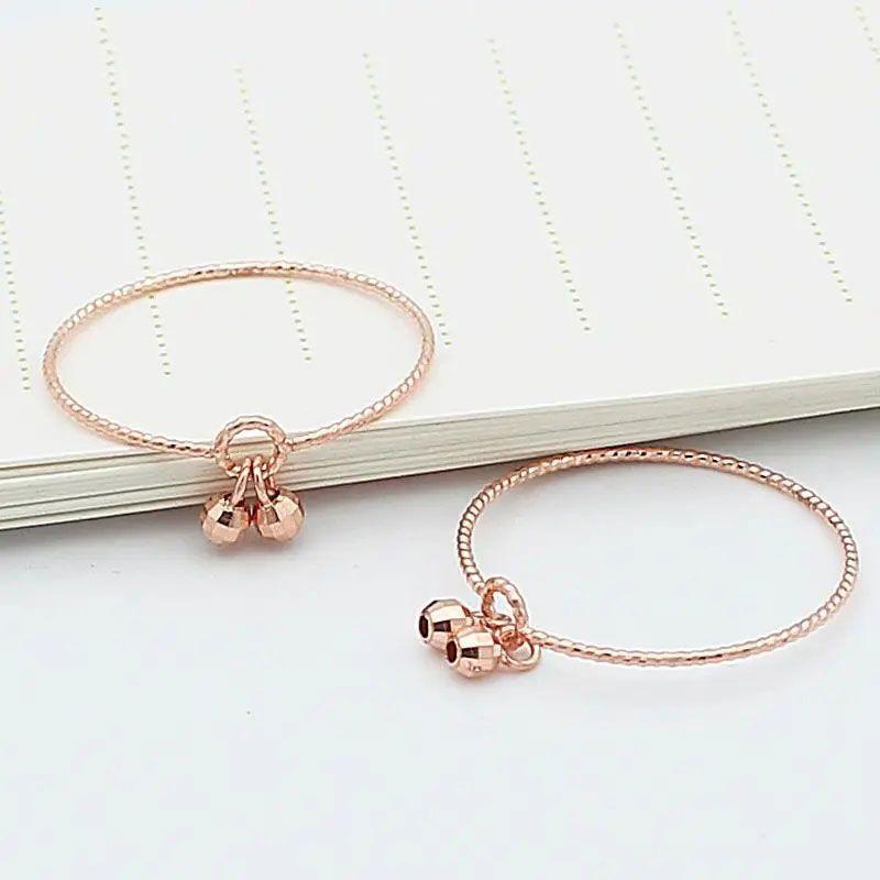 

Russian Colored Gold Purple Gold Fashion Trend Exquisite Index Finger Ring Plated Rose Gold Small Bell Live Ring