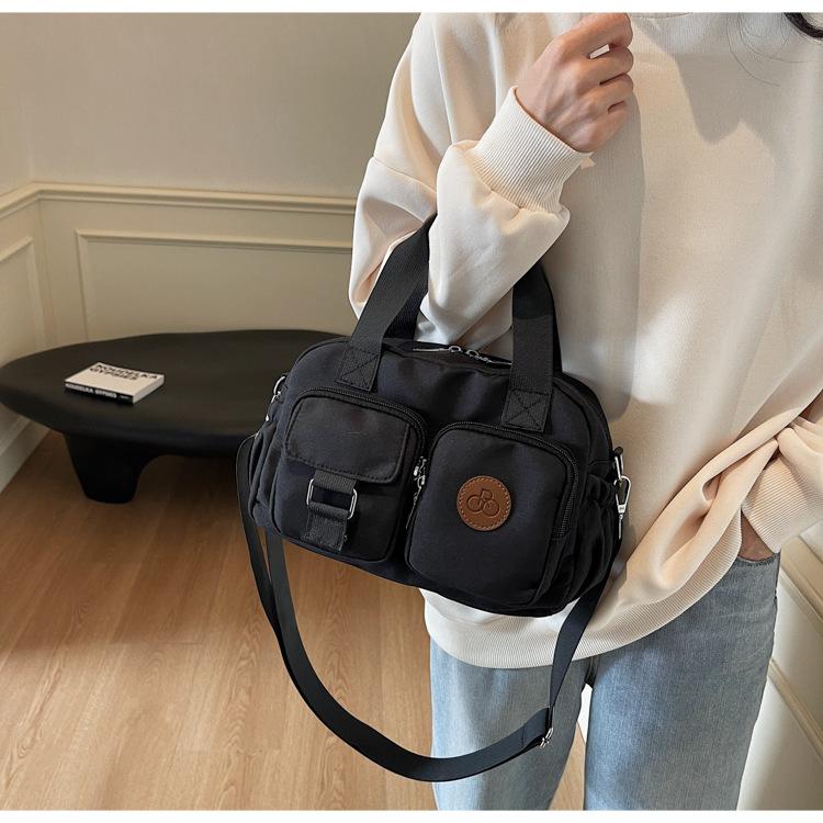 Multi-pocket retro casual handbag 2025 new nylon bag simple shoulder messenger bag