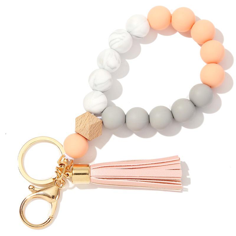 Silicone and Wooden Bead Keychain Bracelet with PU Tassel