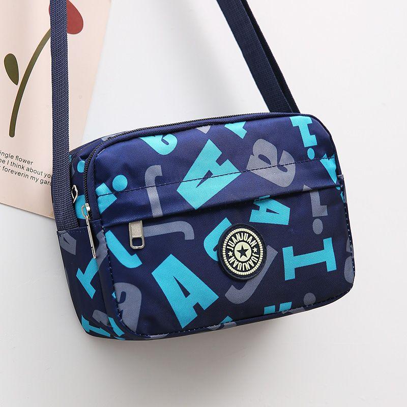 

Сумка кроссбоди из ткани Оксфорд большой вместимости, модная для среднего возраста 9912 Large Creative Letters