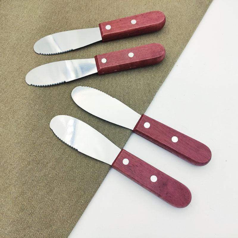 

Stainless Steel Butter Spreader Equipped with A Wooden Handle and Featuring A Wide and Straight Blade Edge Kitchen Tools