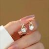 Gold Tone Teardrop Stud Earrings With Criss-Cross Cubic Zirconia Accents, Elegant Round-Cut Center Stone For Maximum Sparkle Comfortable Design