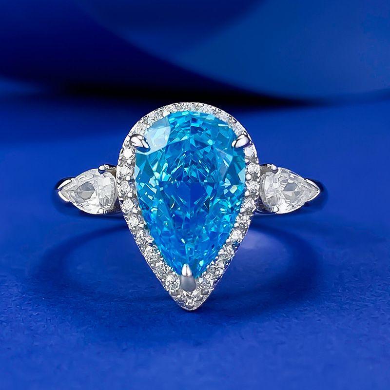 Xiancan Jewelry European & American Cross-border S925 Silver Ring: 7x11 Pear-shaped Aquamarine & High Carbon Diamond, Women's White Gold Band