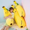 Super soft banana long throw pillow, leg pinch plush toy on bed, simulated fruit doll, grab machine doll