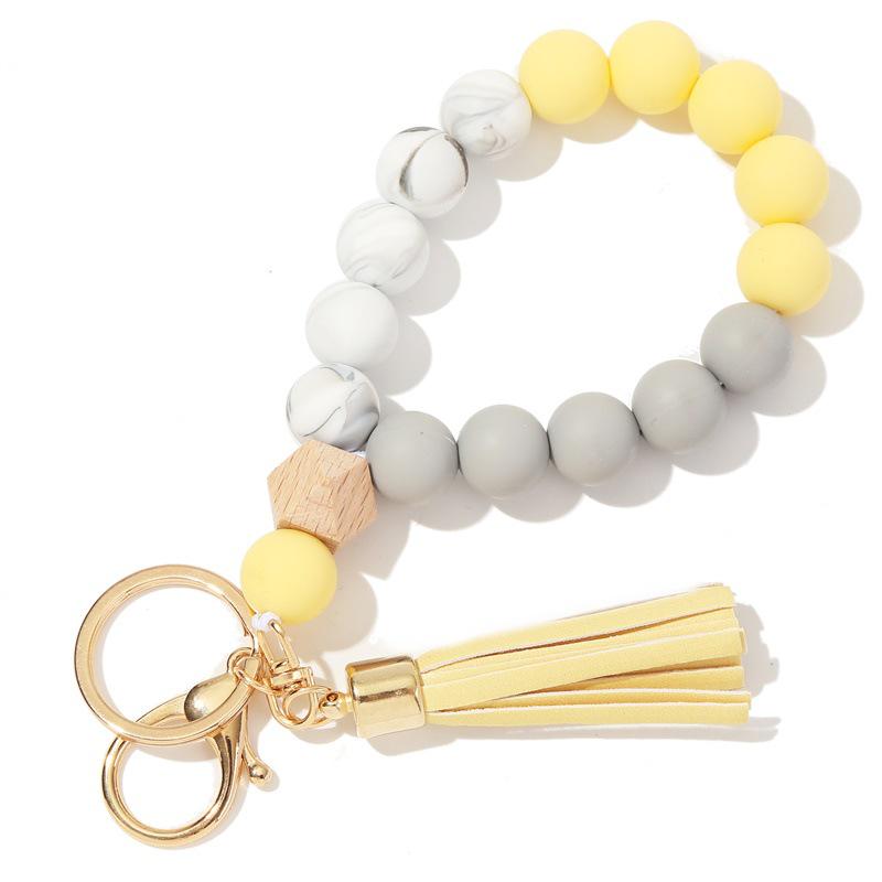 Silicone and Wooden Bead Keychain Bracelet with PU Tassel