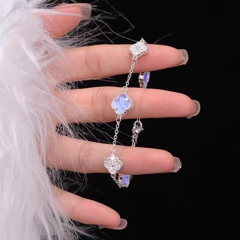 Silver Four Leaf Clover Bracelet Adjustable Chain Link Charm Bracelet for Women Elegant Jewelry Accessory with Clover Shaped Pendants One Size