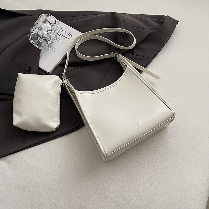 Premium feeling hand carrying bucket bag women's Korean version fashion versatile shoulder bag 2025 spring and summer new simple casual women's bag