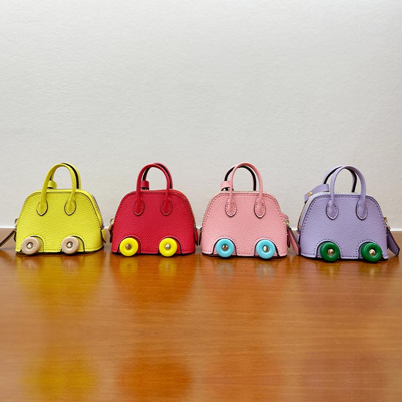 Mini Wheel Shell Bag Charm: Cute Coin Purse & Earphone Accessory - New Bowling Bag Charm