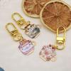 Exquisite Cat Keychain: Japanese Style Cartoon Cup Charm - A Delightful Gift for Friends.