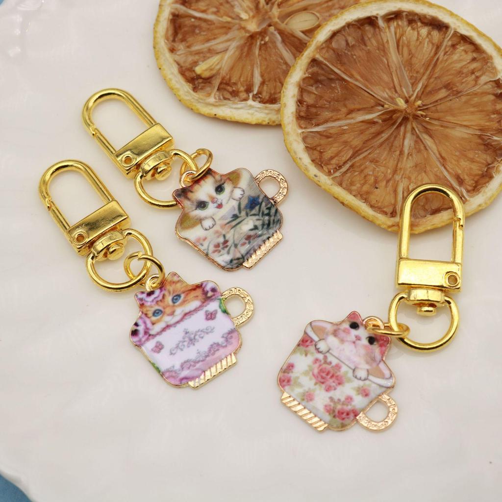 Exquisite Cat Keychain: Japanese Style Cartoon Cup Charm - A Delightful Gift for Friends.