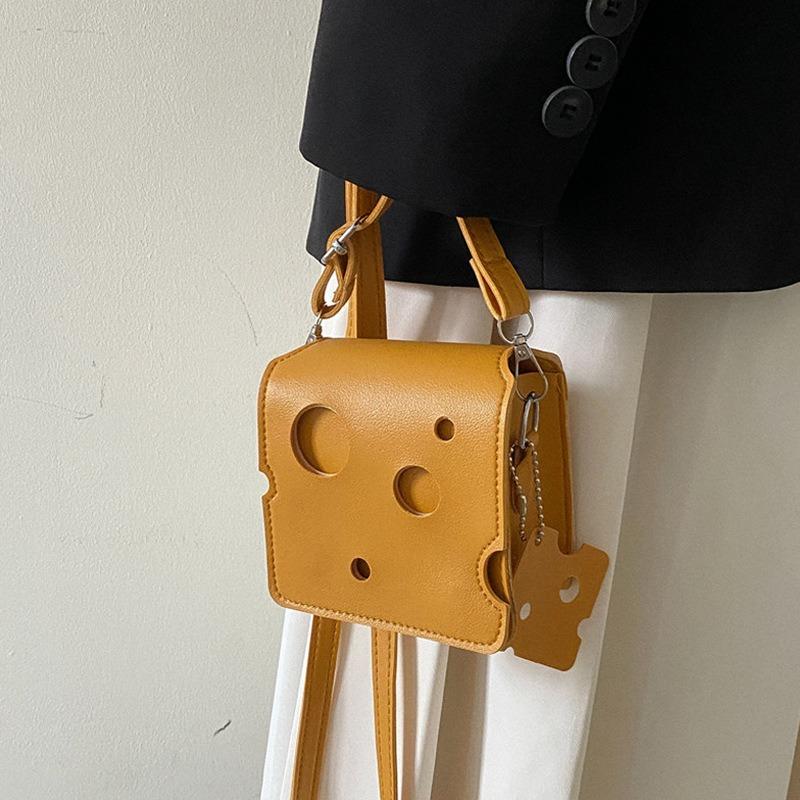 Small Square Bag with Niche Design New Trendy and Cute Mini Hole Cheese Triangle Lipstick Earphones Crossbody Loose Change