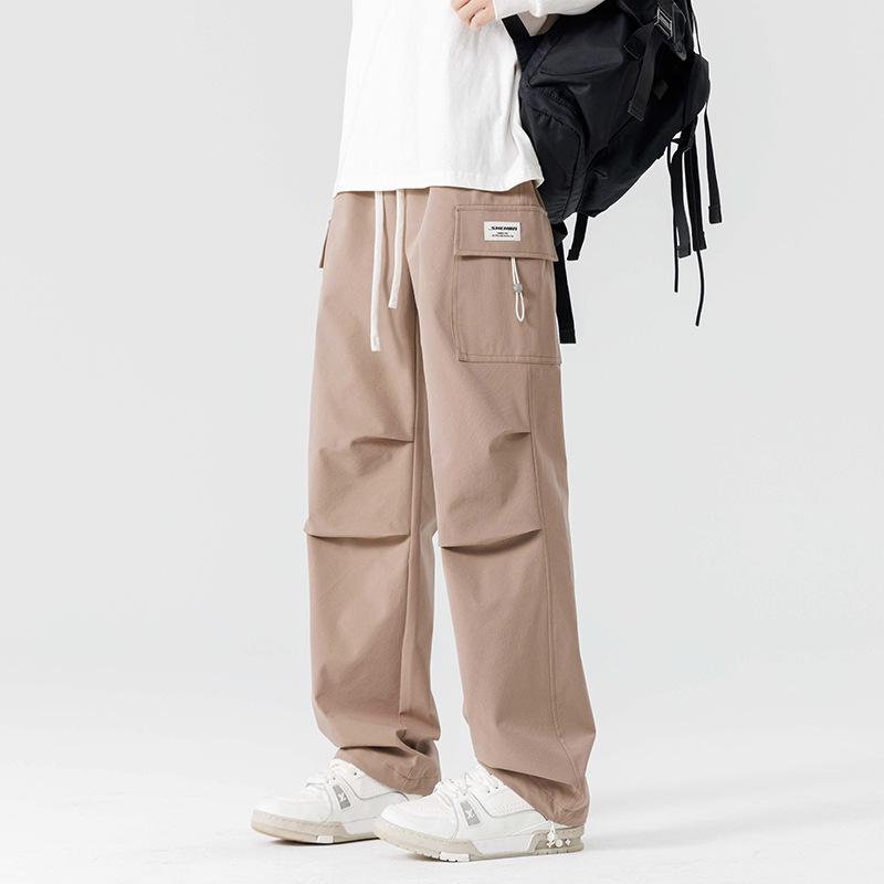 

Men s Autumn Trendy Brand Tied Feet Casual Trousers Loose Pants 4XL