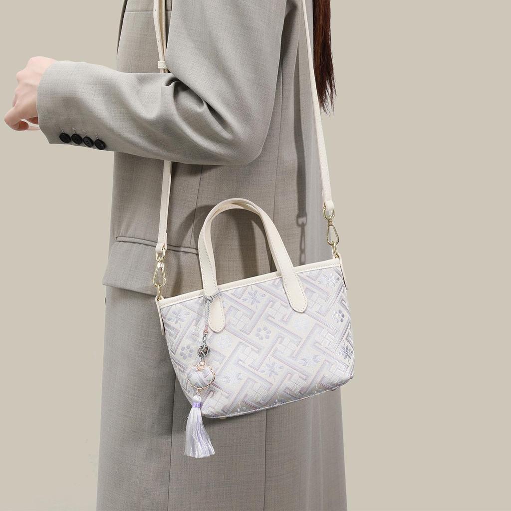 Guangxi Zhuang Brocade Women's Versatile Bag - 2026 High-End, Simple Design, Handheld, Shoulder, Crossbody.