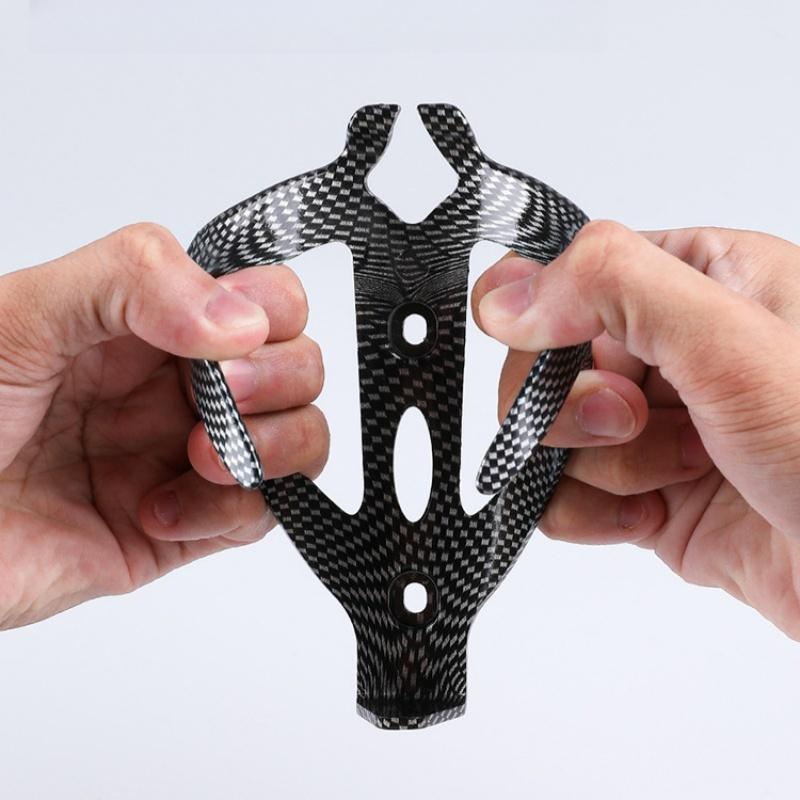 Universal ABS Bike Water Bottle Holder with Carbon Texture - Anti-Slip Cycling Cup Cage for Mountain Road Bikes Accessories