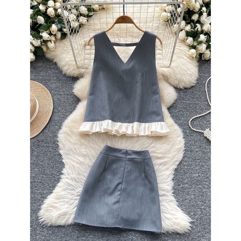 Online Celebrity Ins Niche Popular High-Grade Sense Summer Clothing Two-piece Set Sleeveless Loose Bow Vest High Waist Skirt