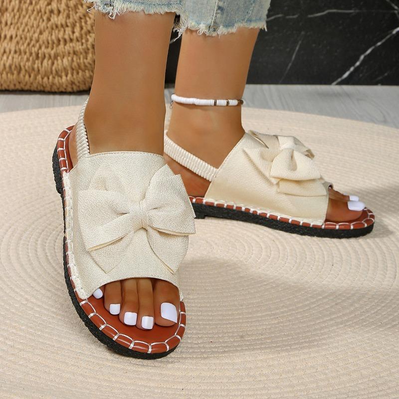 Summer new flat-bottomed bow one-word sandals women wear solid color lightweight cloth sandals