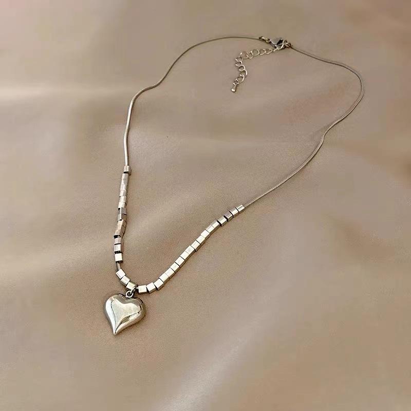 Silver titanium steel love necklace, female tide niche design, simple and fashionable collarbone chain, temperament versatile sweater chain