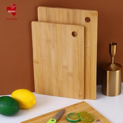 Huawei Portable Bamboo Cutting Board with Round Hole Hook - No Paint or Wax. Ideal for Kitchen and Fruit Preparation.