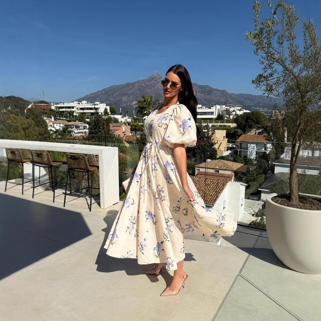 A New Summer Women's Dress with A V-neck, Puffed Sleeves, Printed Ties and A Large Swing