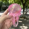 Nee Doh Jelly Squish-Super Solid Squish Stress Ball, Glitter Filled Jellyfish Fidget Toy for Anxiety Relief, Soft Squeeze Sensory Toy for Kids  Adults