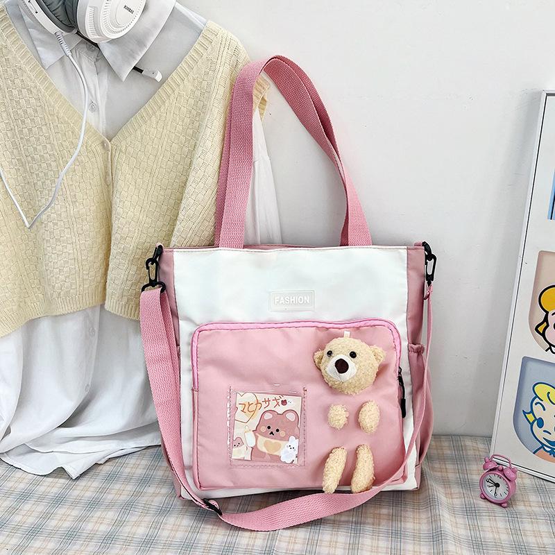 

Contrast color women s bag large-capacity shoulder bag new women s bag student dual-purpose tutoring bag hand bag messenger bag розовый