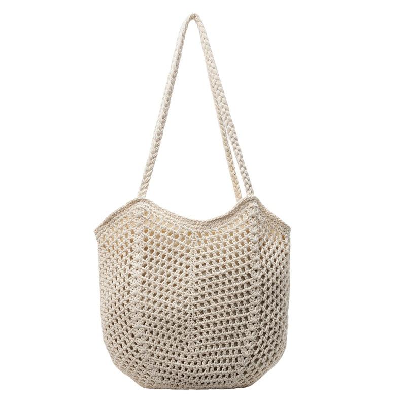 Woven bag women's large-capacity new spring and summer versatile leisure hollow shoulder vacation beach tote bag