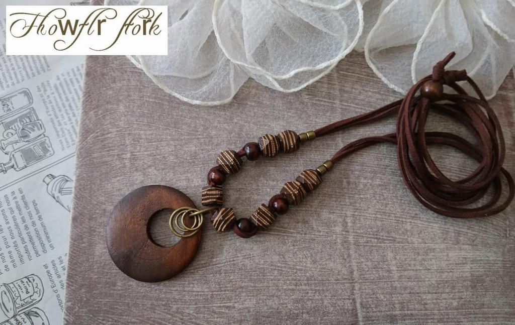Leather necklace Wooden parts metal natural antique taste Striped pattern brown Wood Made in [flower storm] & (Accessories Japan)