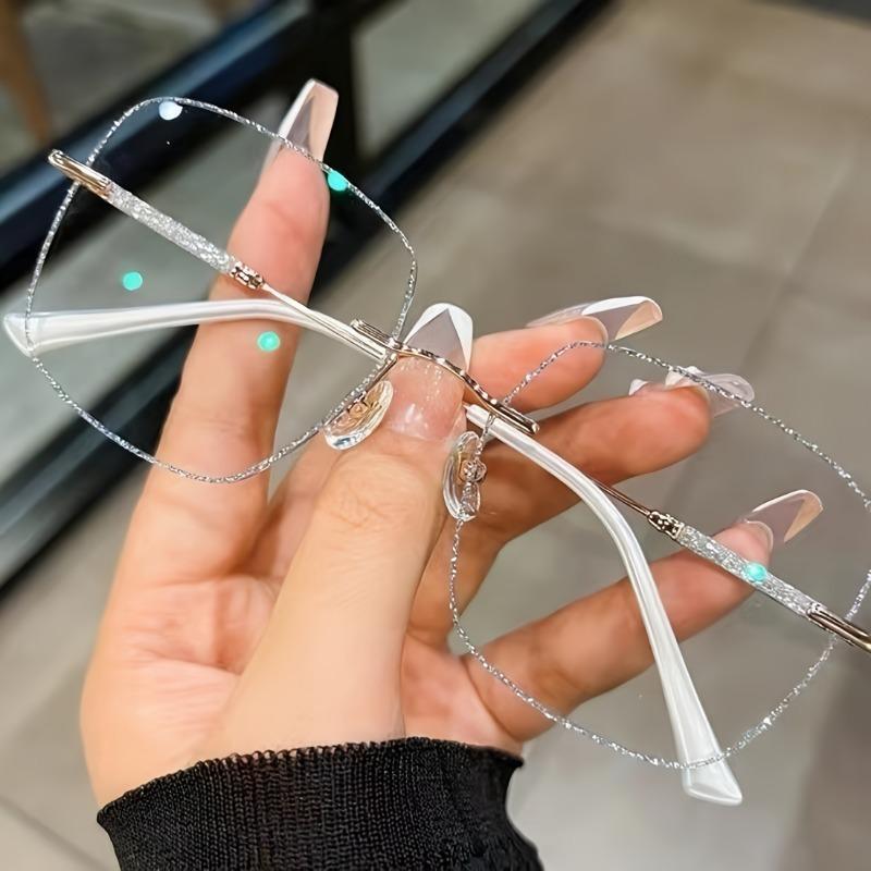 A Pair Of Frameless Transparent Lenses For Women With A Sparkling Galaxy Frame