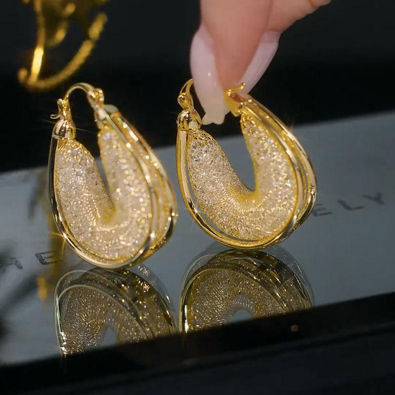

Light luxury high-end Hong Kong style mesh super flash crystal geometric earrings niche design ear buckle temperament personalized earrings