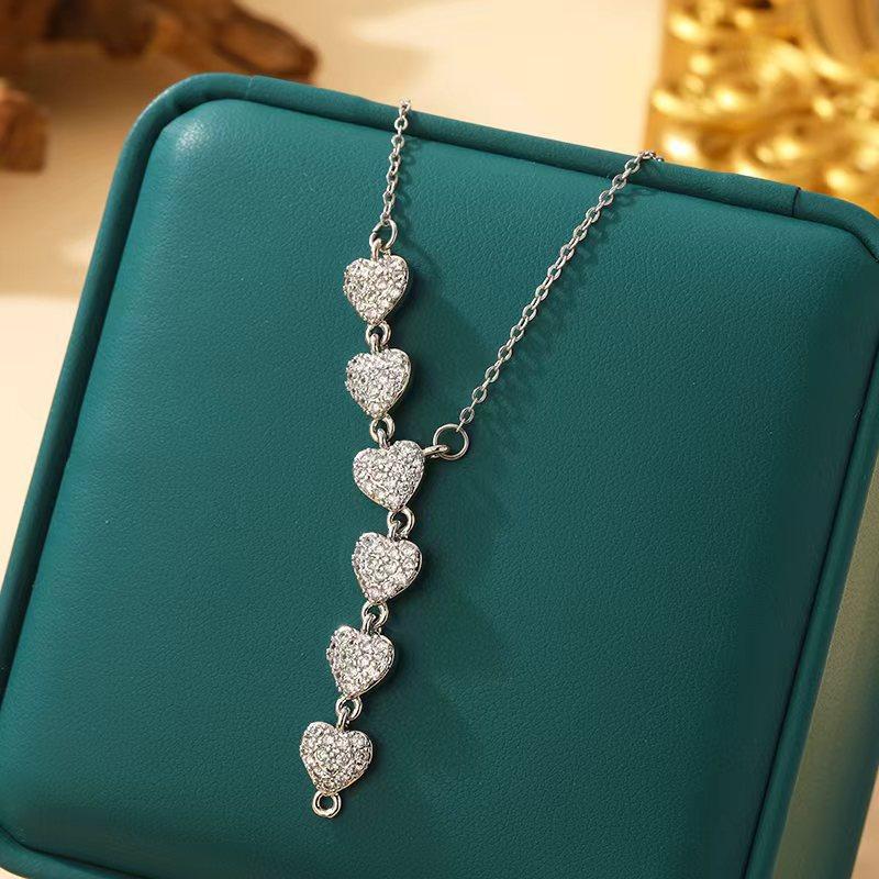 

Exquisite Sparkling Light Luxury Pendant Necklace With Tassel And Four-Leaf Clover Design Micro-Set Full Diamond Flower Collarbone Chain For Women